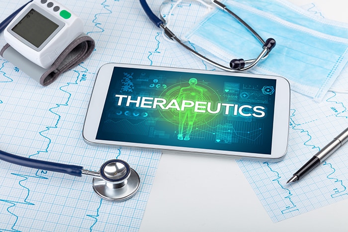 Tablet pc and doctor tools with THERAPEUTICS inscription