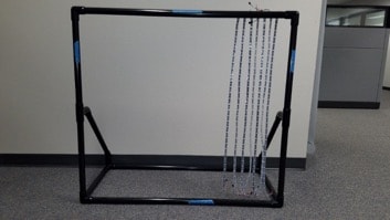 LED strips mounted to a PVC frame for easy transportation.